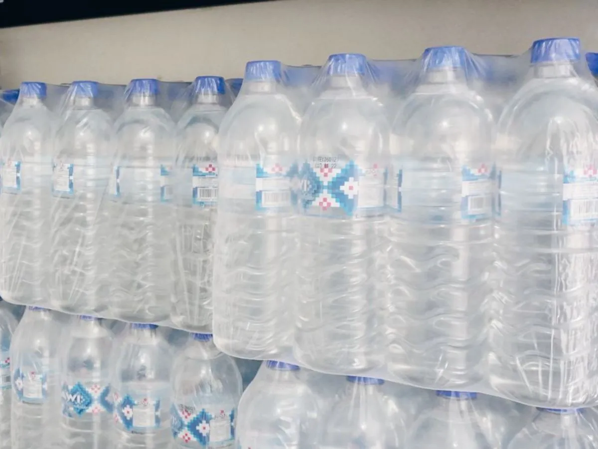 icono gota de agua con signo de pesos